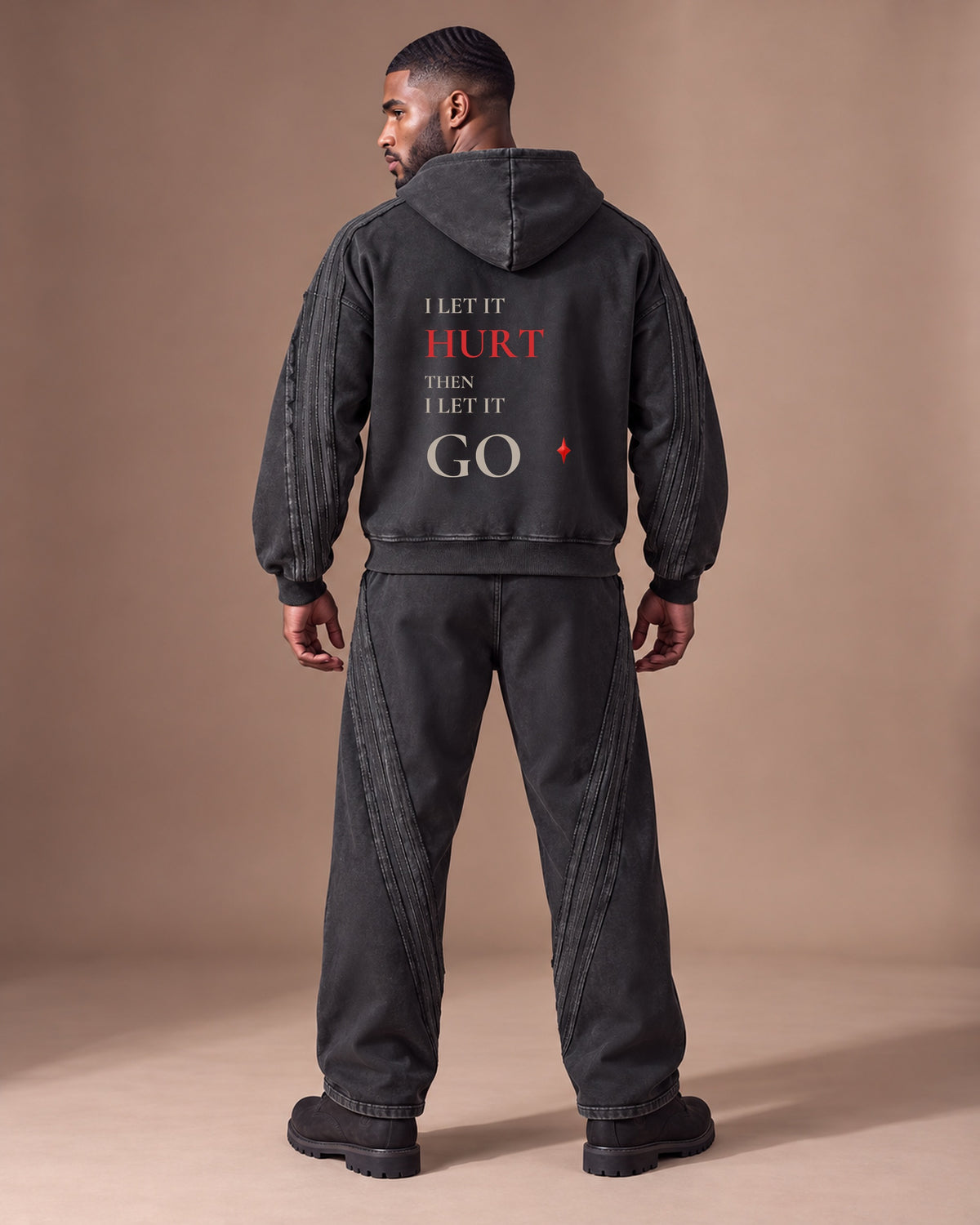 TLOL Release Black zip hoodie matching outfit, back view. Hoodie and pants sold separately.