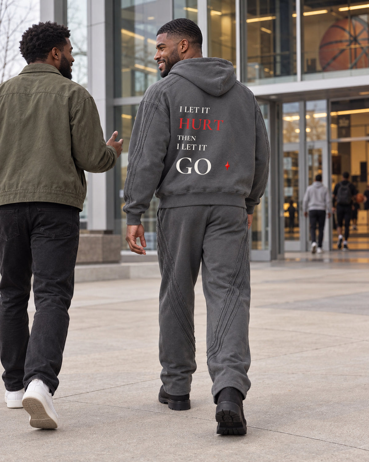 TLOL Release Dark Gray zip hoodie matching outfit, lifestyle view. Hoodie and pants sold separately.