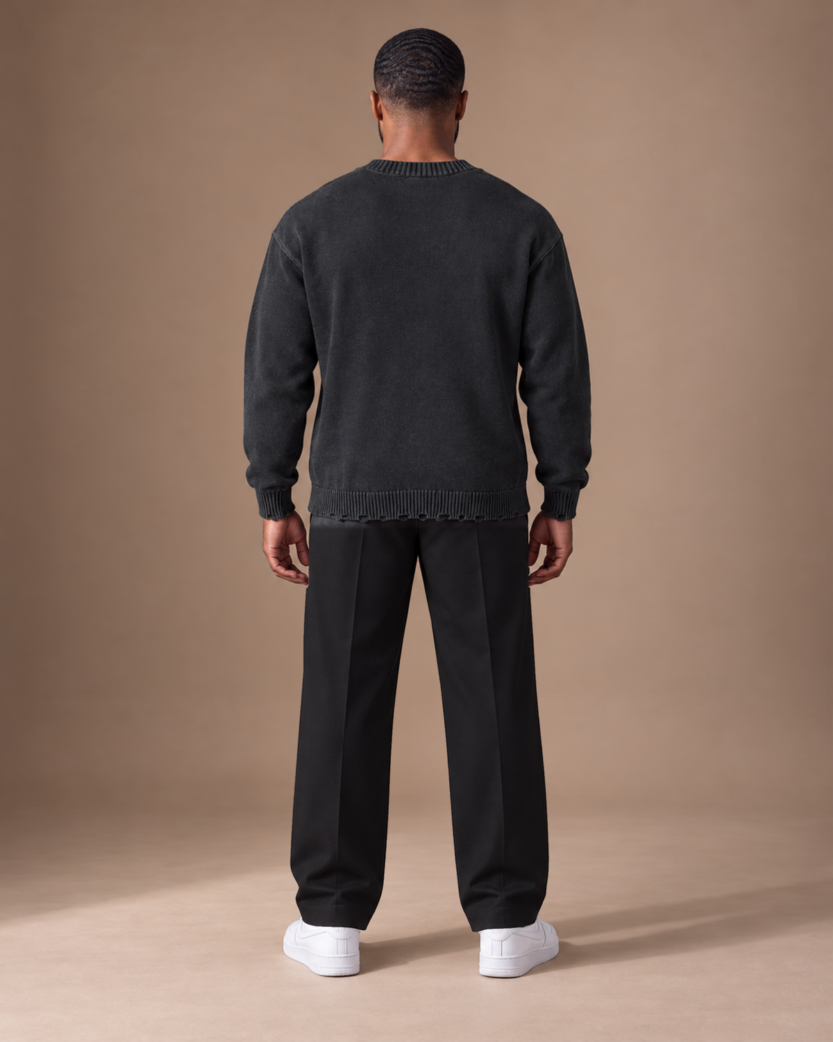 Male model wearing TLOL Black frayed sweater, back
