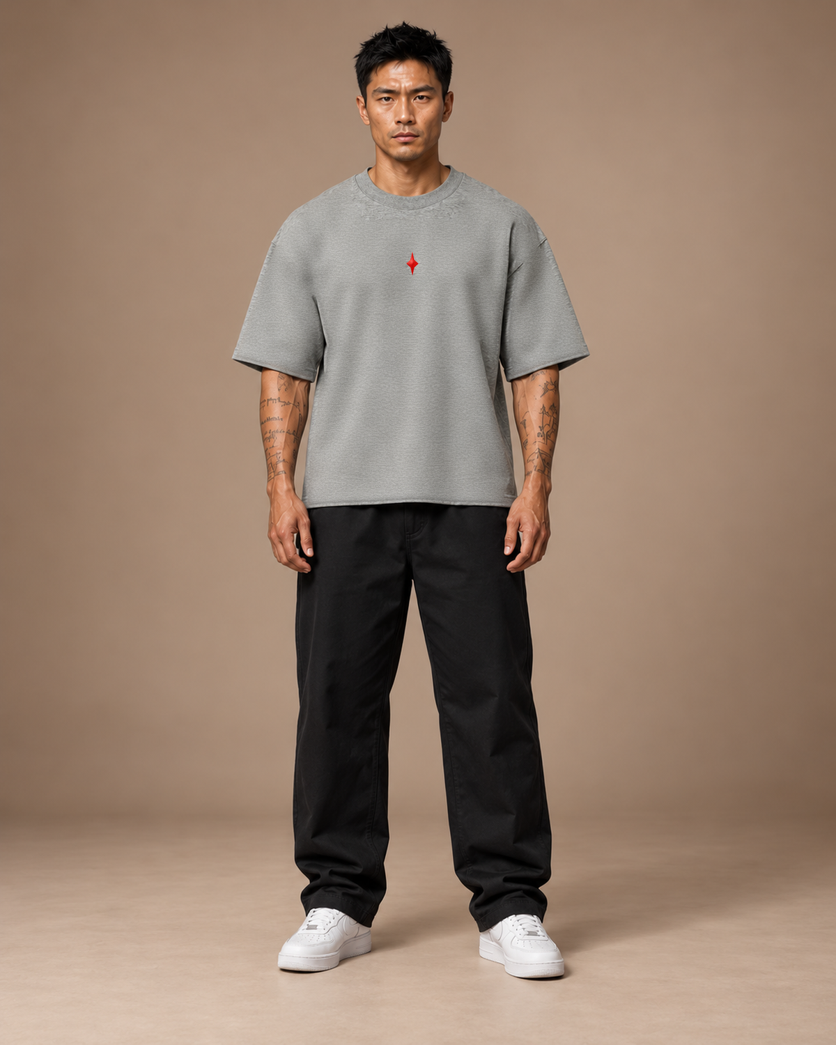 TLOL Lightwell oversized tee in Flower Gray, front view on a model showing the boxy fit.