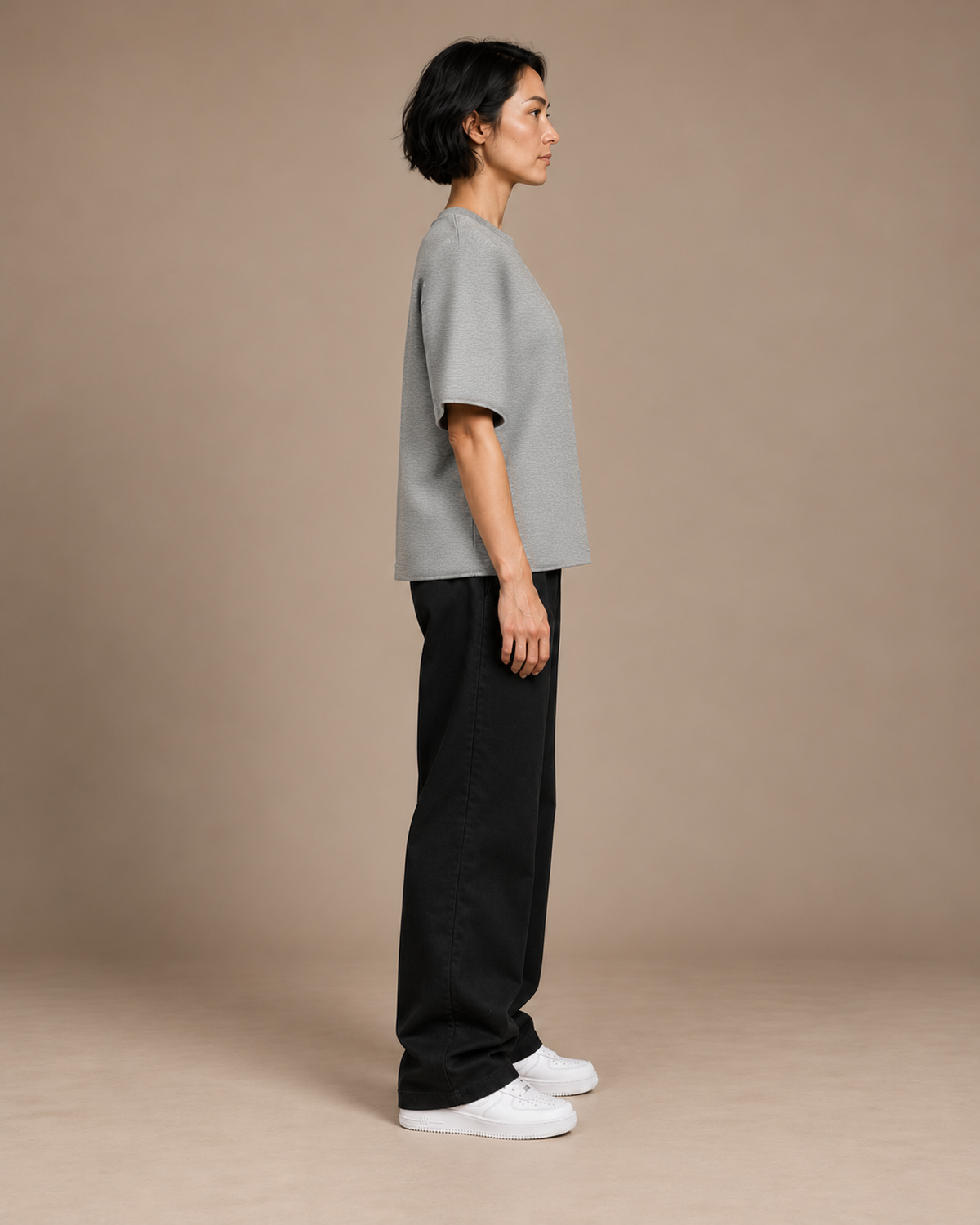 TLOL Lightwell oversized tee in Flower Gray, right-facing side view on a model.