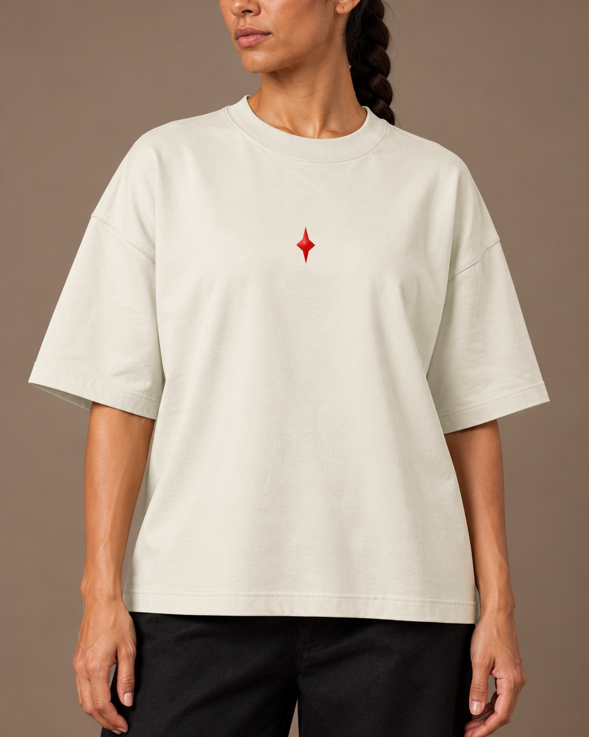 TLOL Lightwell oversized tee in Gray, close-up of the red chest emblem and relaxed fit.