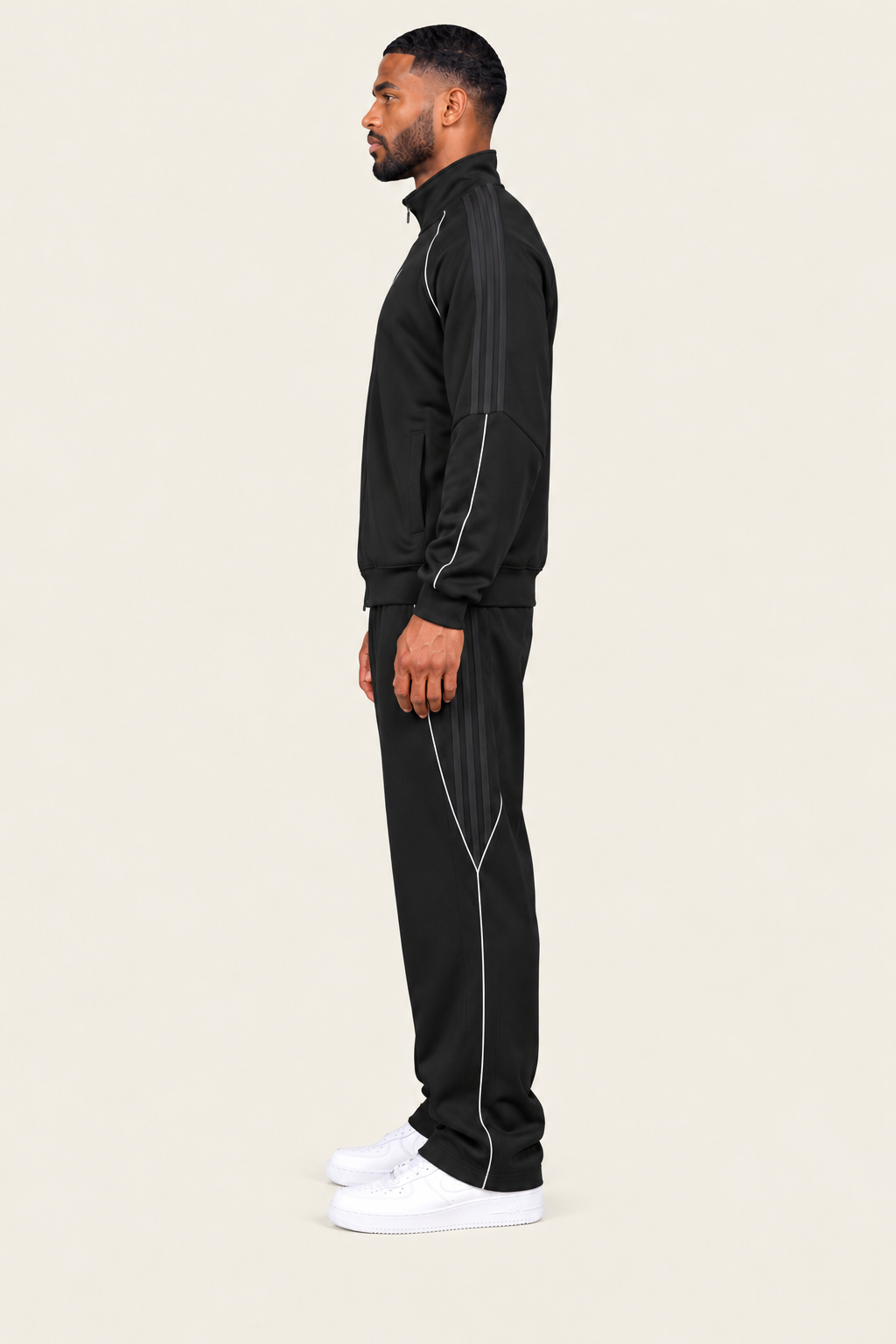 TLOL REFLECTION Black pants, left on light beige. Jacket and pants sold separately.