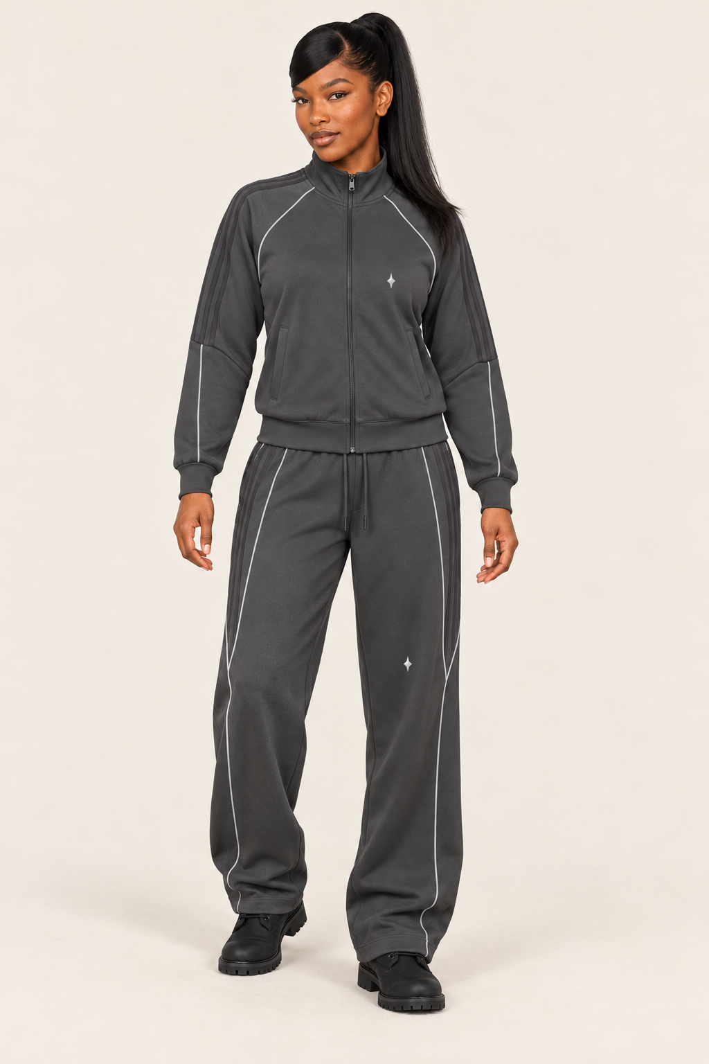 TLOL REFLECTION Dark Gray pants, editorial on light beige. Jacket and pants sold separately.