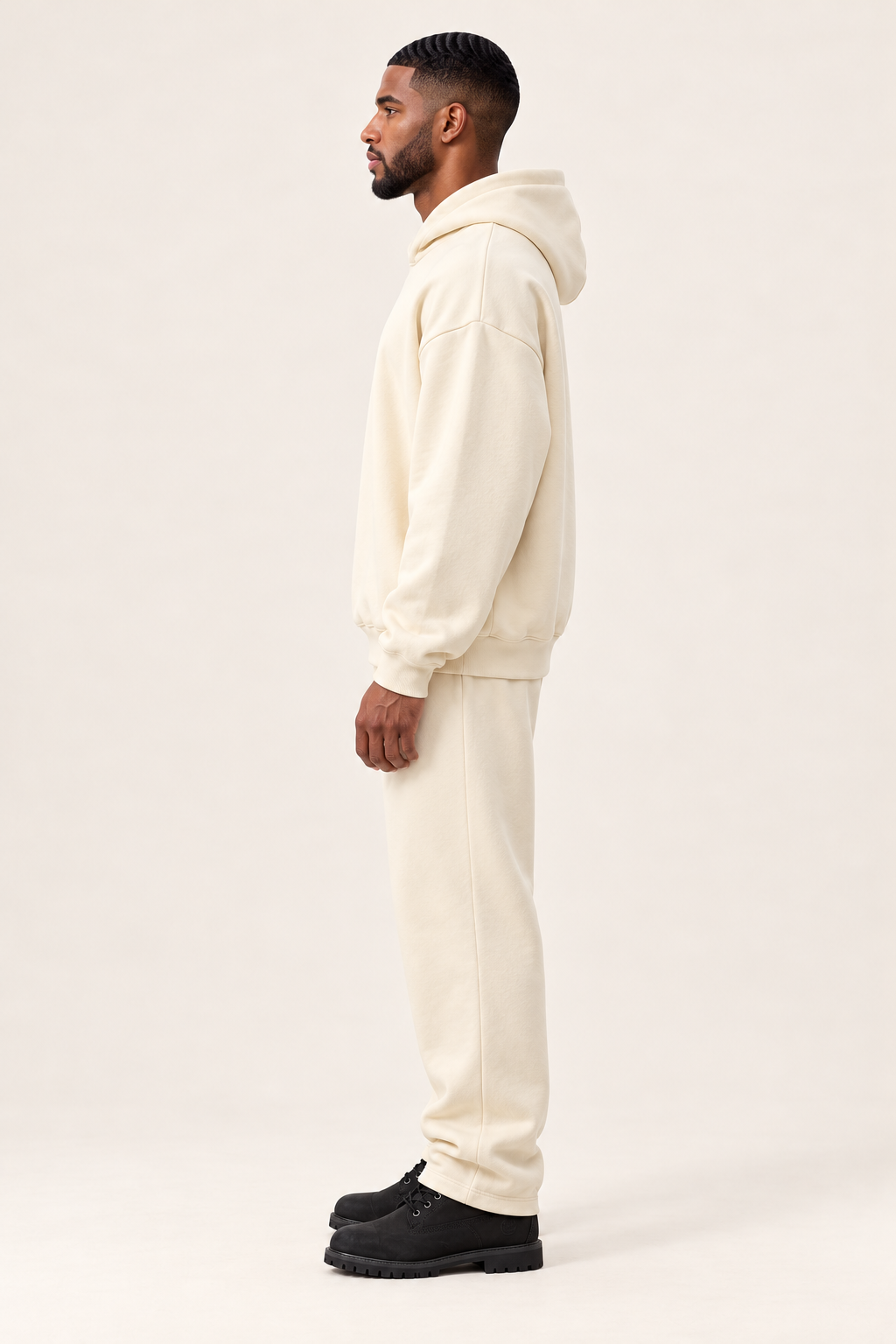 TLOL RELEASE Bone hoodie, true left profile on light beige. Hoodie and pants sold separately.