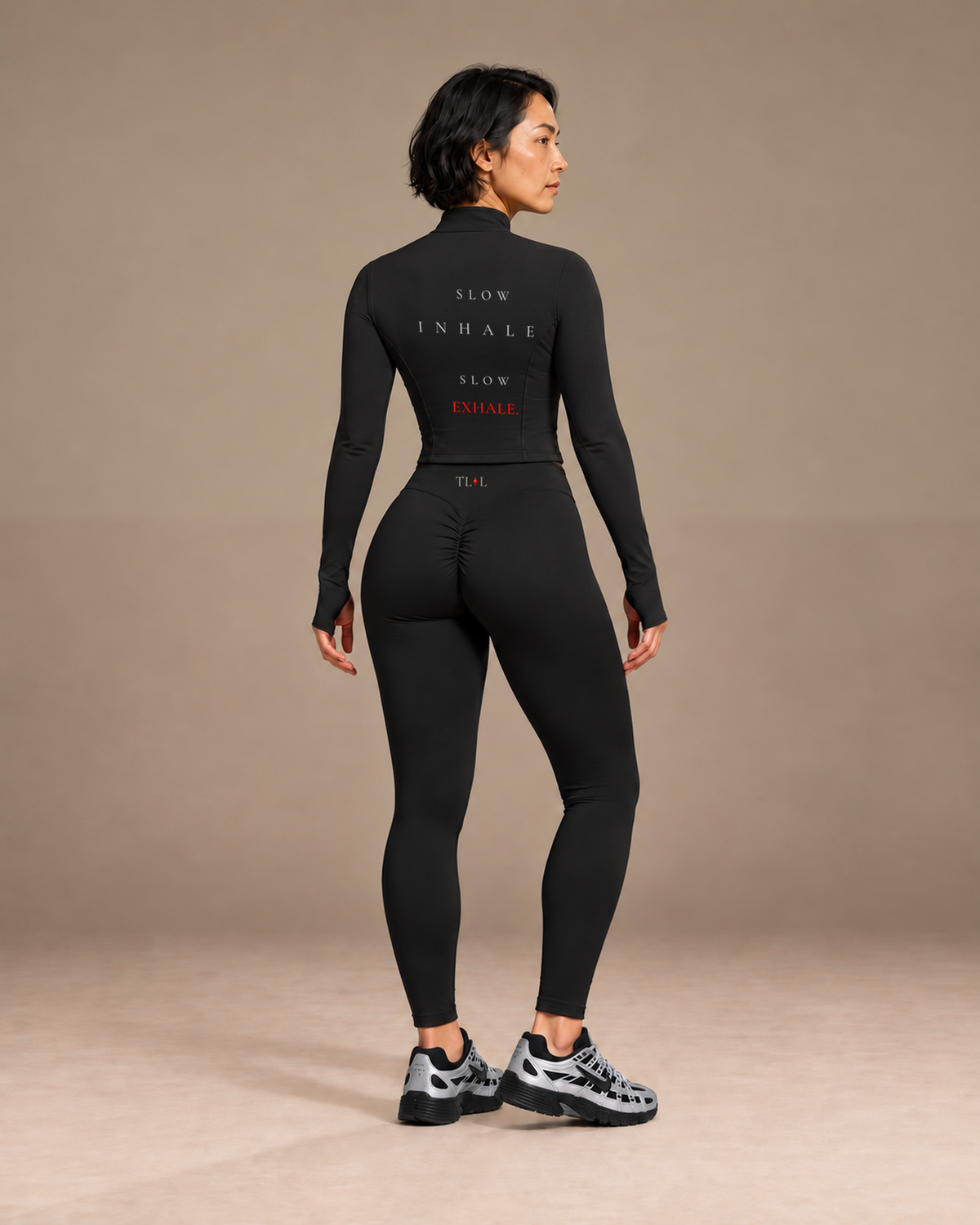TLOL Black yoga jacket outfit mockup, back with centered leggings logo
