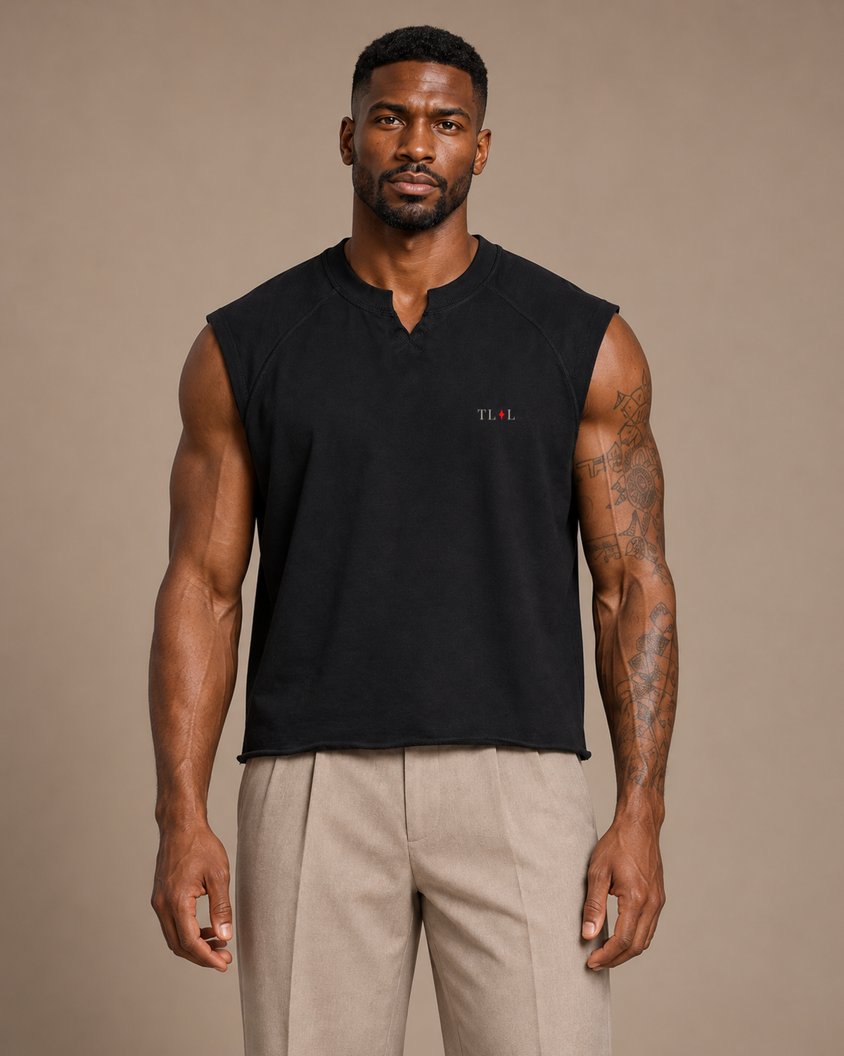 TLOL Boxy Raw-Hem Tank in Black on model, front view.