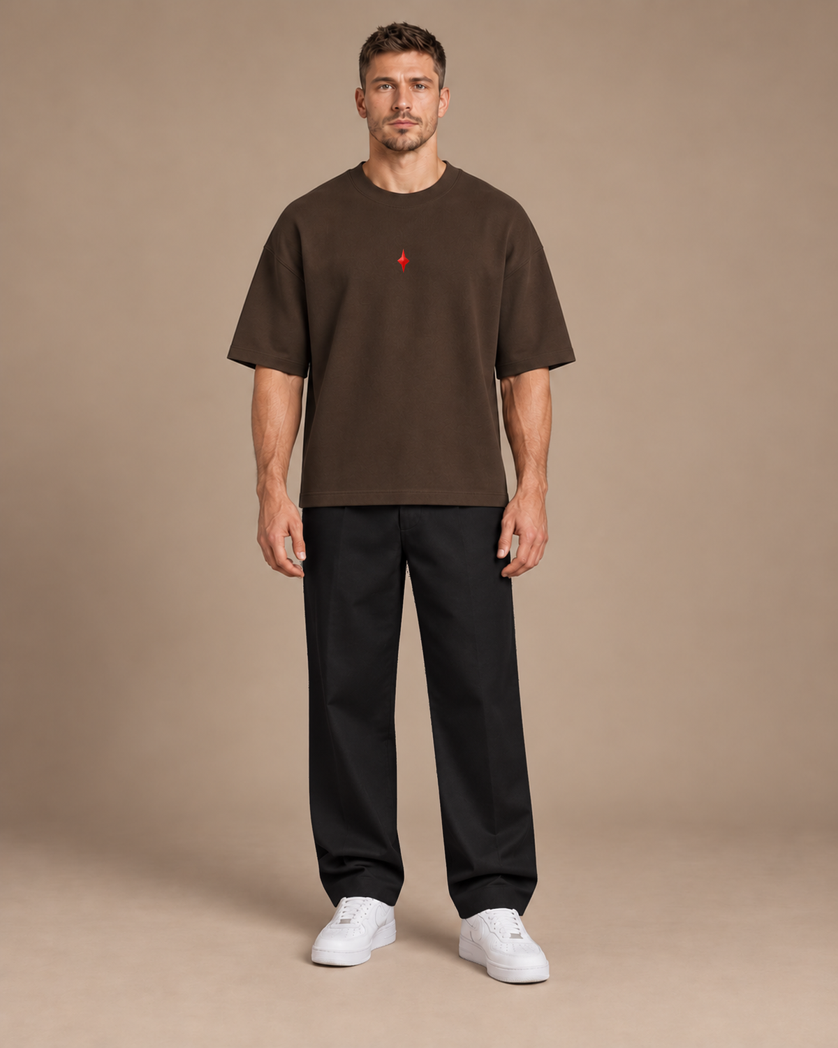 TLOL Lightwell oversized tee in Coffee, front view on a model showing the boxy fit.