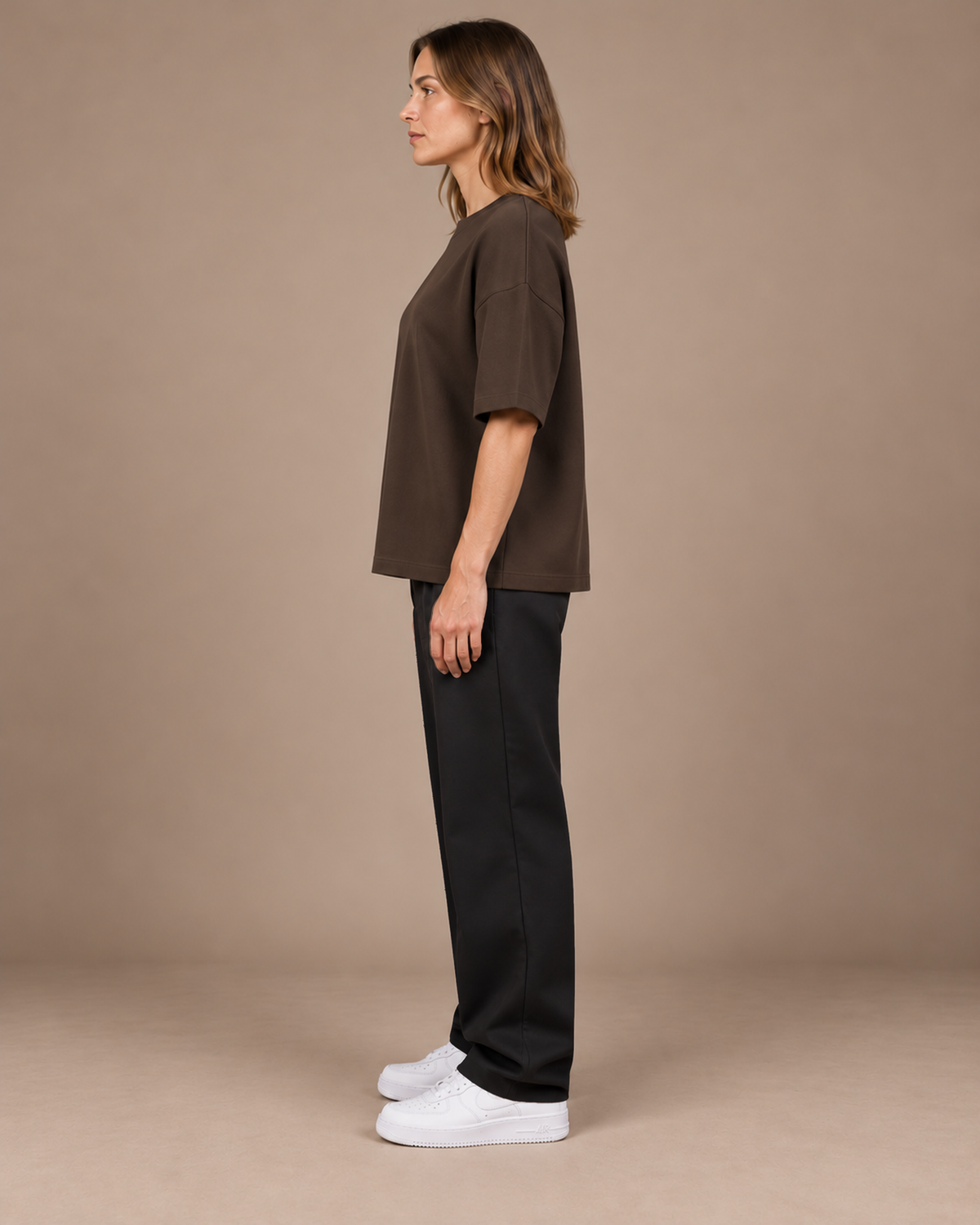TLOL Lightwell oversized tee in Coffee, left-facing side view on a model.