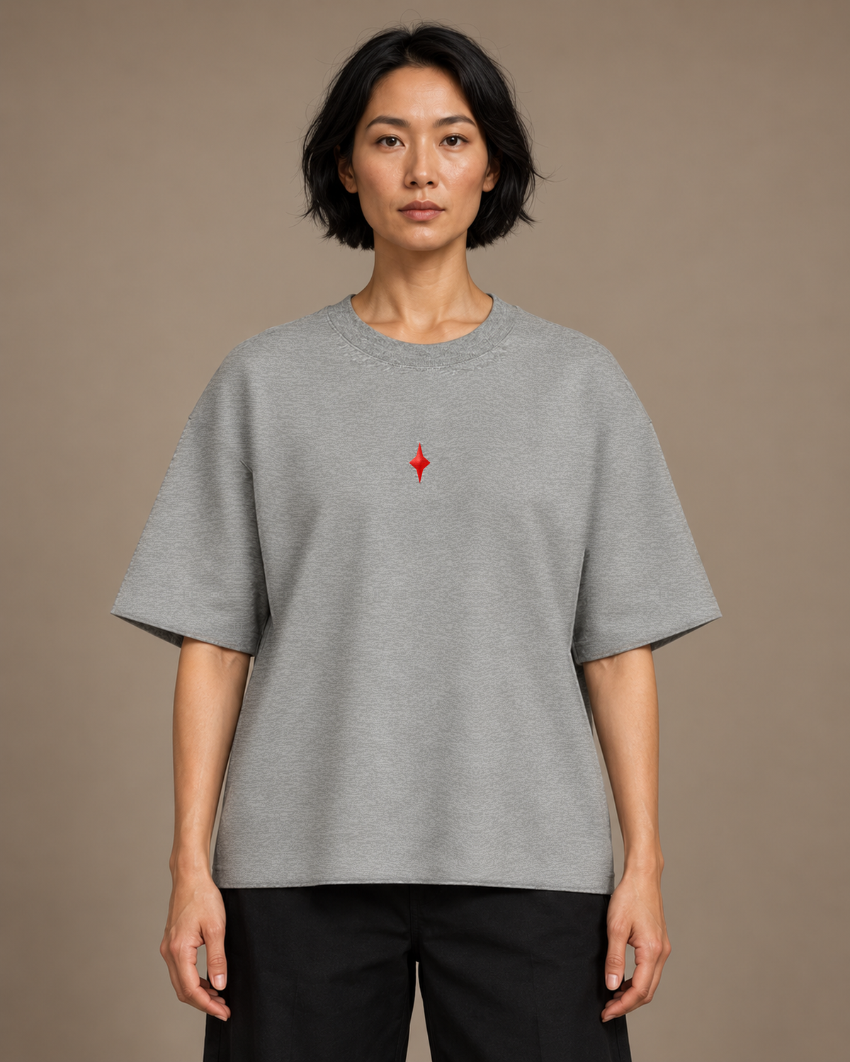 TLOL Lightwell oversized tee in Flower Gray, close-up of the red chest emblem and relaxed fit.