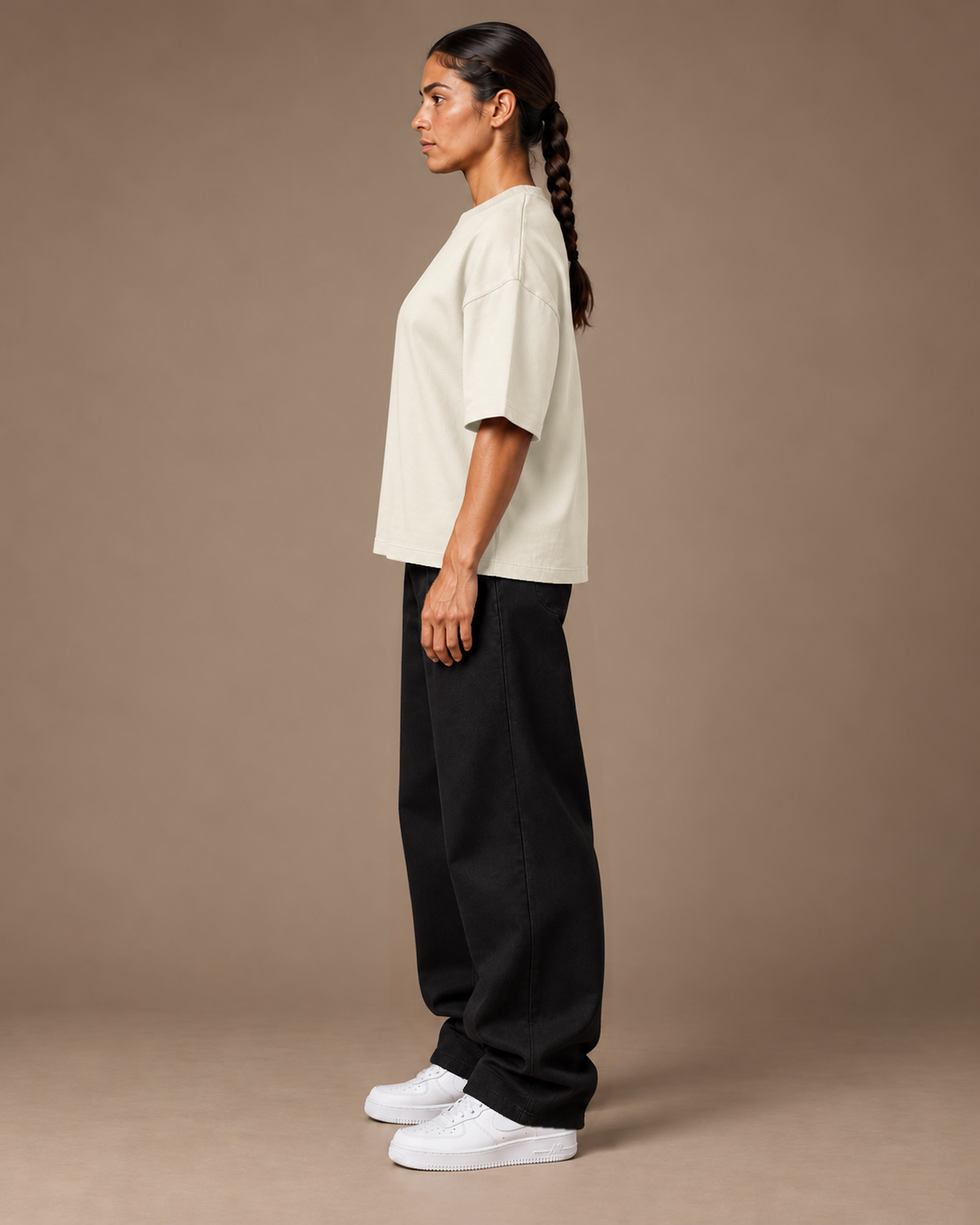TLOL Lightwell oversized tee in Gray, left-facing side view on a model.