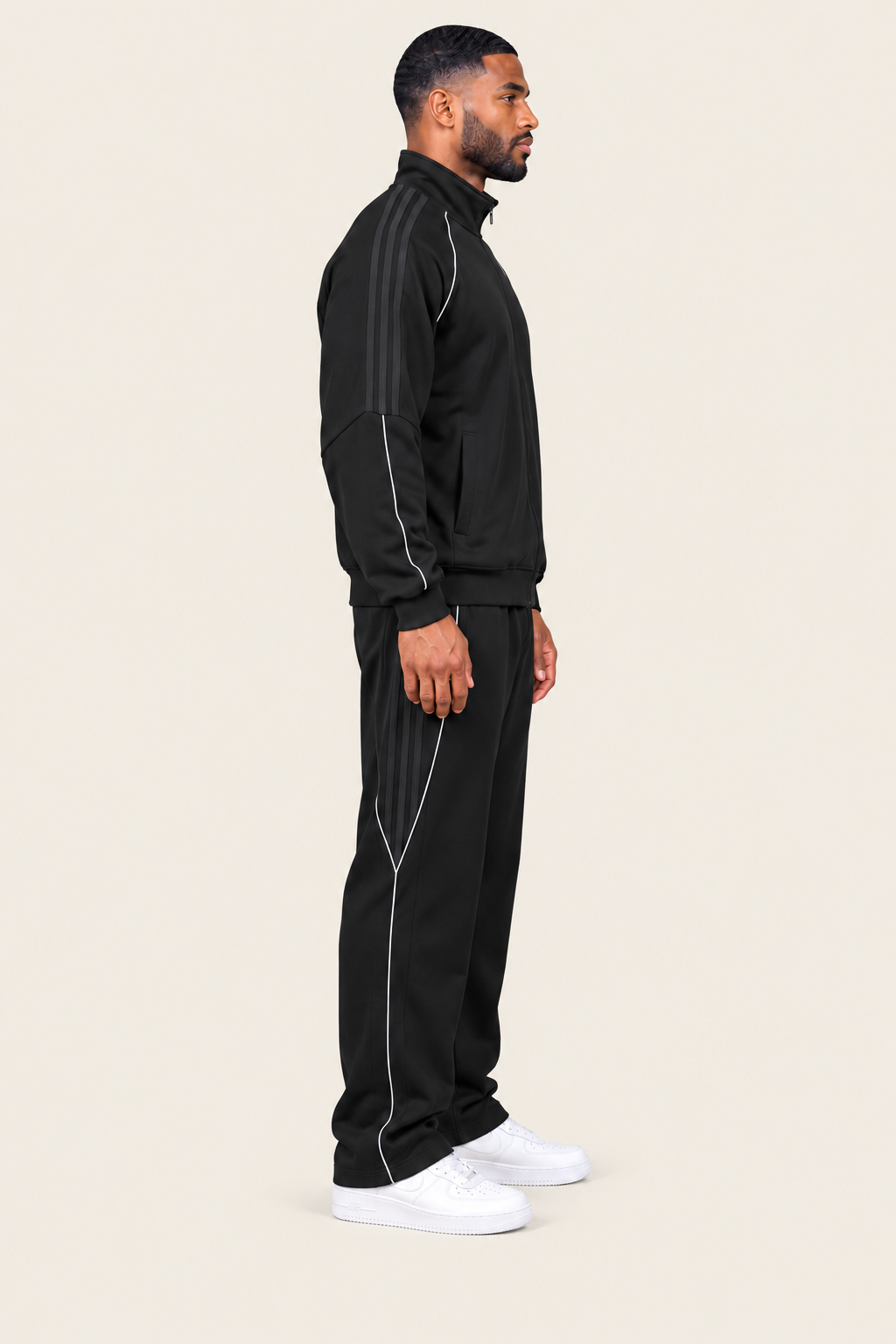 TLOL REFLECTION Black pants, right on light beige. Jacket and pants sold separately.