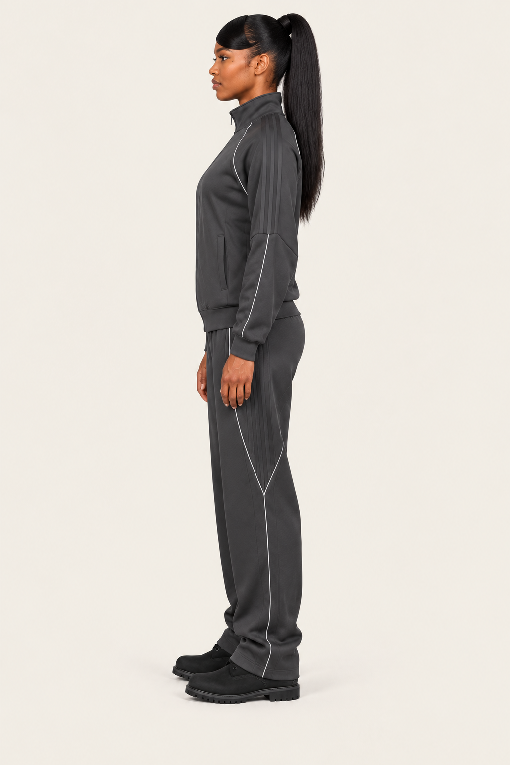 TLOL REFLECTION Dark Gray jacket, left on light beige. Jacket and pants sold separately.