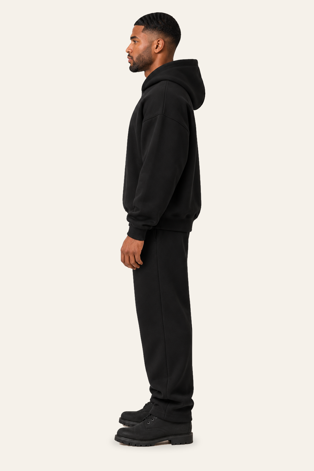 TLOL RELEASE Black Beauty hoodie, true left profile on light beige. Hoodie and pants sold separately.