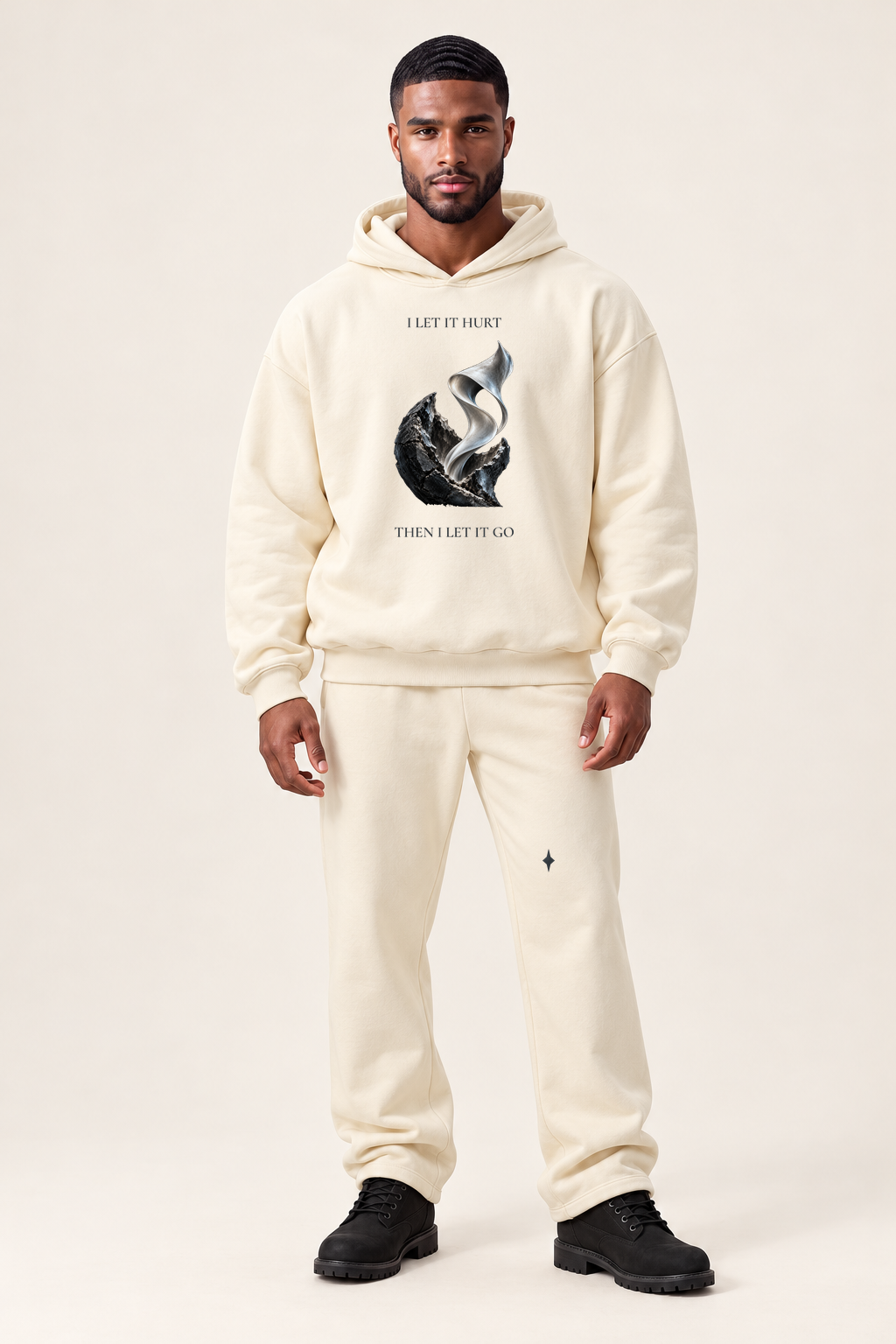 TLOL RELEASE Bone pants, full outfit front on light beige. Hoodie and pants sold separately.