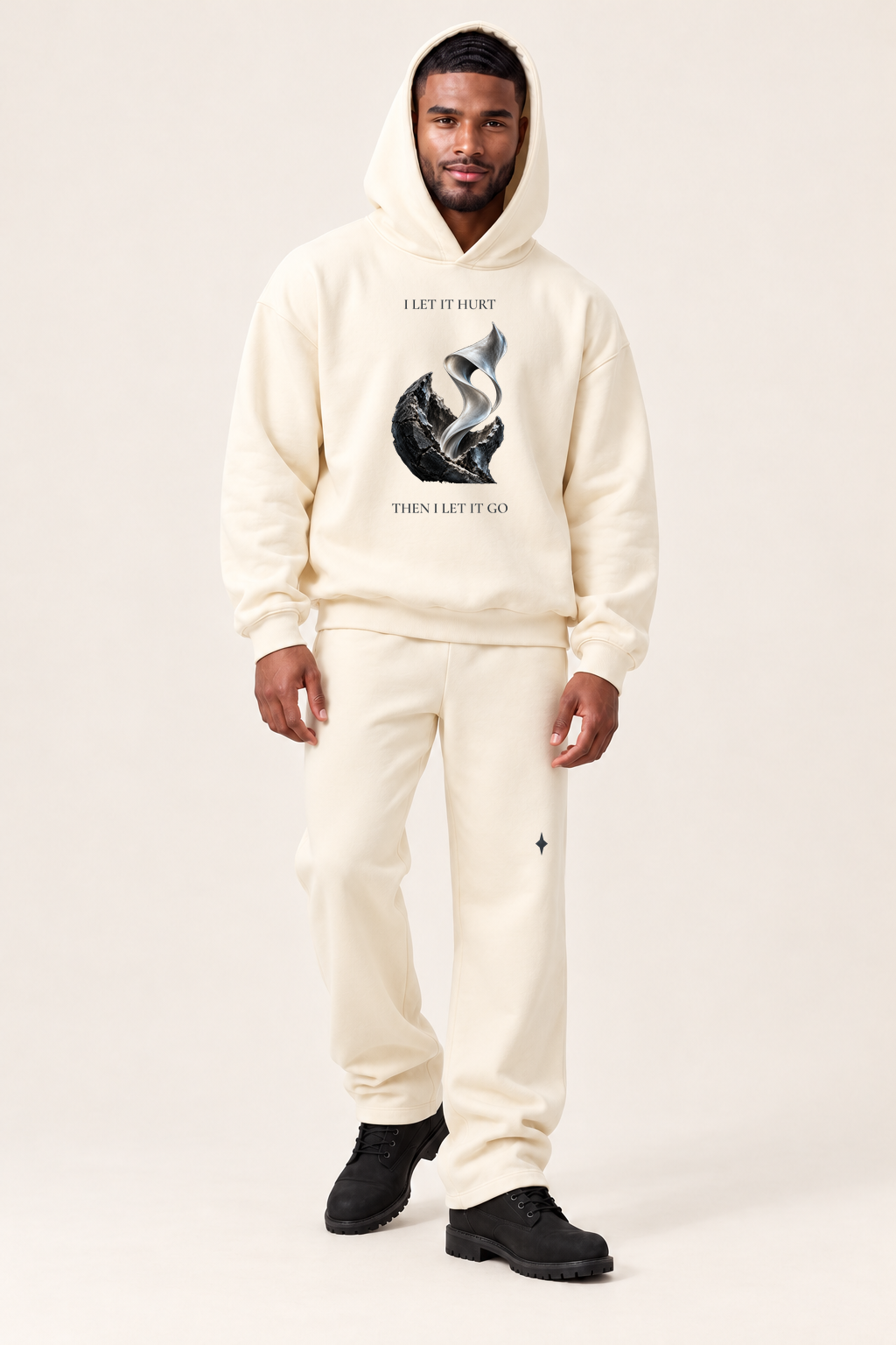 TLOL RELEASE Bone pants, standing editorial on light beige. Hoodie and pants sold separately.