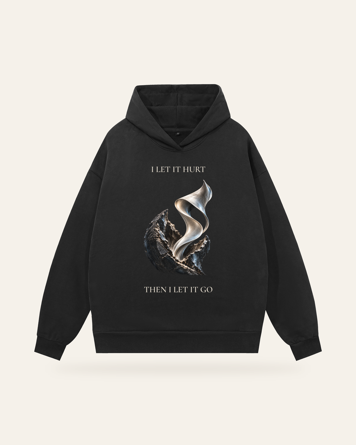 TLOL RELEASE Charcoal hoodie, product only / front on light beige. Hoodie and pants sold separately.