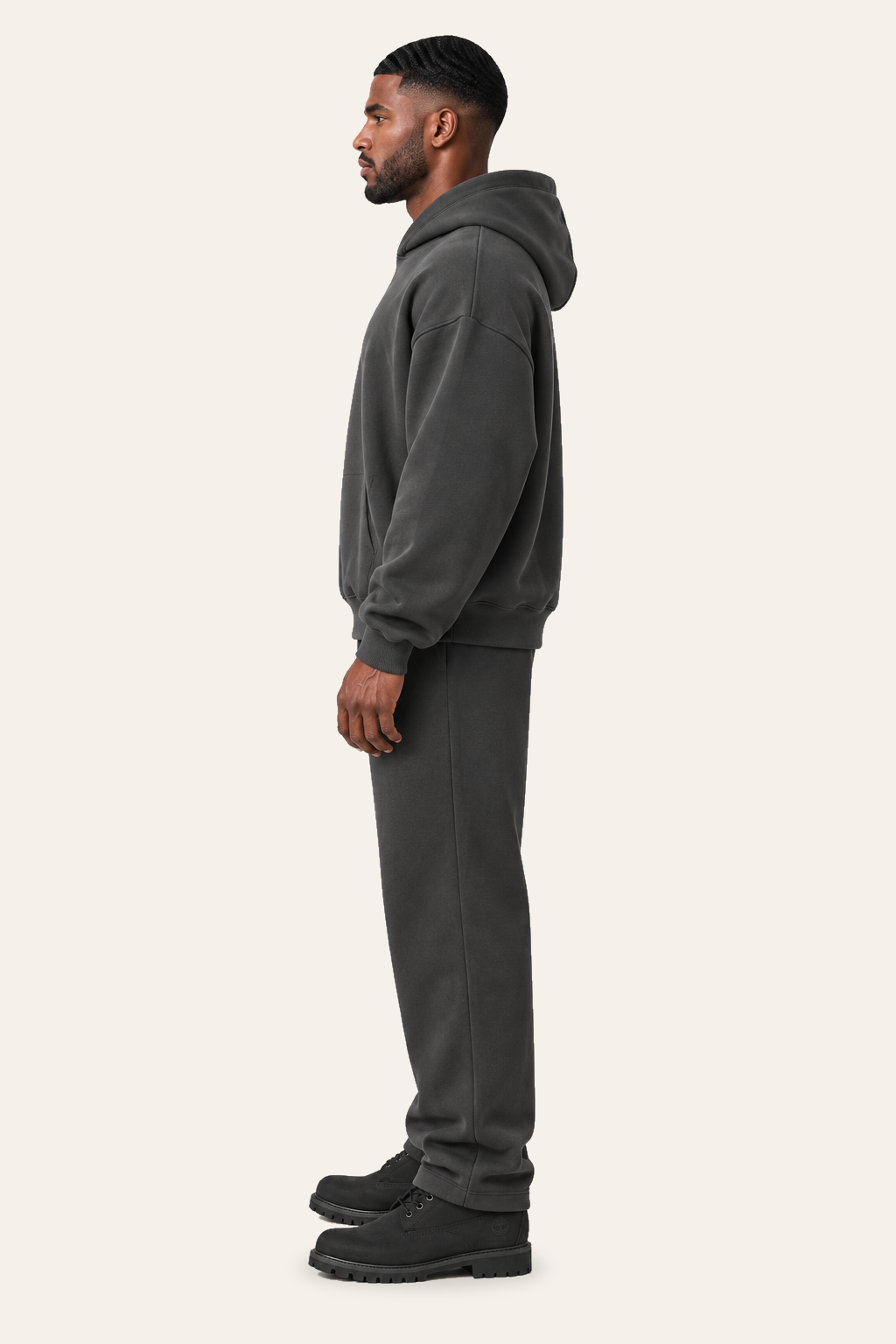 TLOL RELEASE Charcoal pants, true left profile on light beige. Hoodie and pants sold separately.