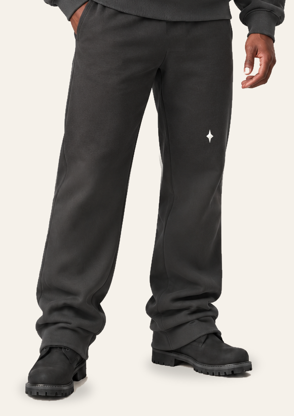 TLOL RELEASE Charcoal pants, waist through shoes on light beige. Hoodie and pants sold separately.
