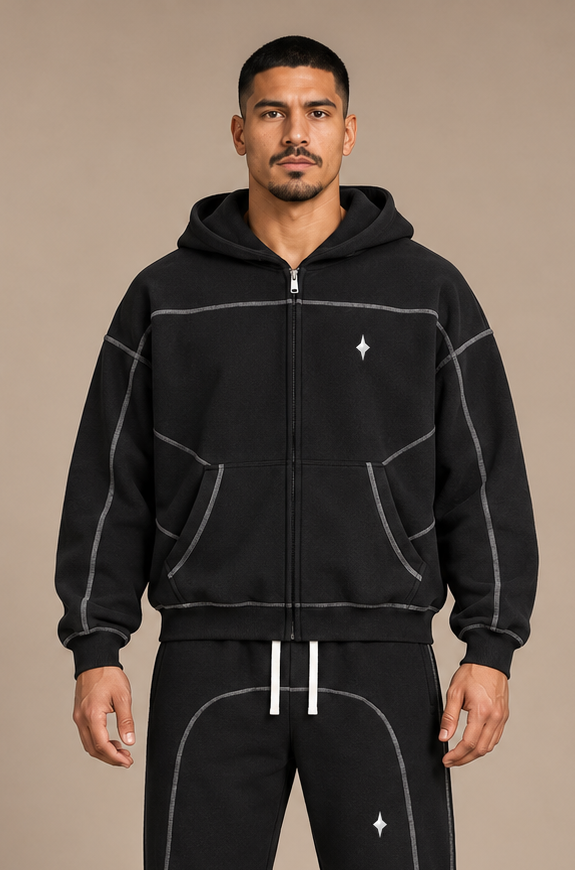 Black TLOL contrast-stitched fleece hoodie, close on-body model view #Color_black