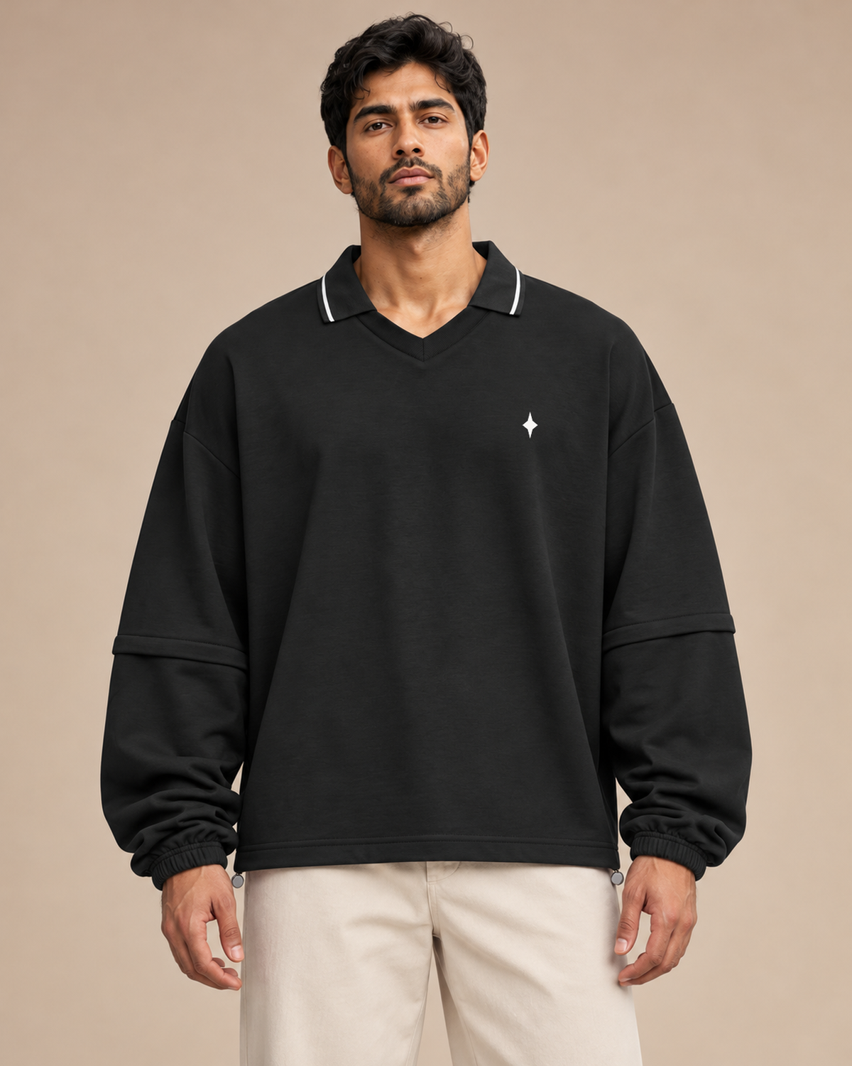 Model wearing the Black TLOL Collared Detachable Sweatshirt, fully assembled front view.